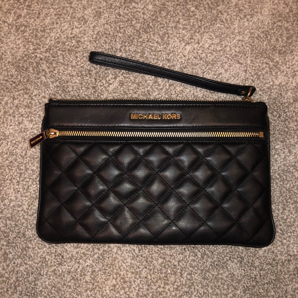 USED ONCE: Michael Kors leather clutch